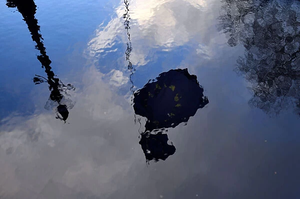European Union flag is reflected on water during Anti-Brexit protests in London