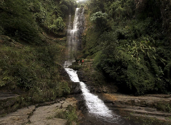 A general view of a waterfall at the Juan Curi natural park near the municipality