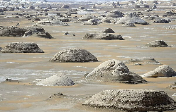 Rocks known as El Mokhimat are seen in the Old White Desert near the Farafra Oasis