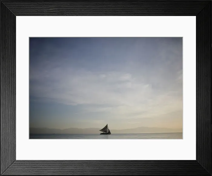 Framed Print : A boat sails next to the shore in Port-au-Prince Framed Print : A boat sails next to the shore in Port-au-Prince