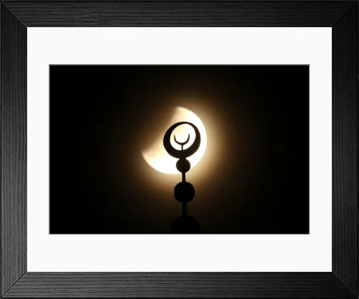 Framed Print : The moon is seen during a partial lunar eclipse in Yevpatoriya Framed Print : The moon is seen during a partial lunar eclipse in Yevpatoriya