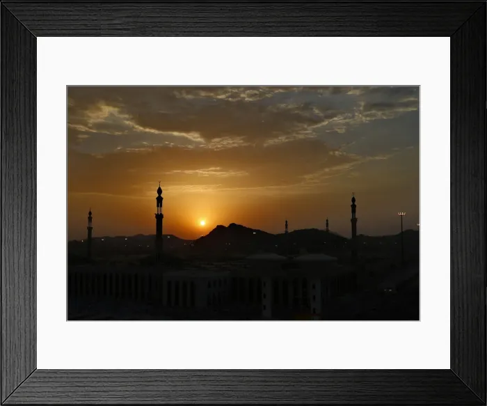 Framed Print : The sun sets over Namirah mosque on the plains of Arafat during the annual haj pilgrimage