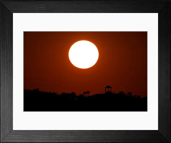 Framed Print : People are silhouetted against the setting sun at El Mirador de la Alemana in Malaga Framed Print : People are silhouetted against the setting sun at El Mirador de la Alemana in Malaga