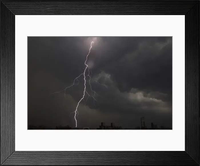 Framed Print : Lightning is seen above buildings during a storm in central Shanghai Framed Print : Lightning is seen above buildings during a storm in central Shanghai