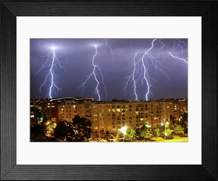 Framed Print : Lightning strikes over buildings during a thunderstorm in Belgrade Framed Print : Lightning strikes over buildings during a thunderstorm in Belgrade