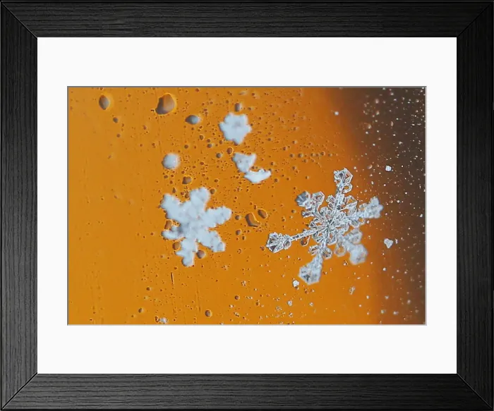 Framed Print : Snowflakes collect on a car window during a winter nor easter snow storm in Waltham Framed Print : Snowflakes collect on a car window during a winter nor easter snow storm in Waltham