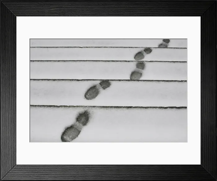 Framed Print : Footprints can be seen on the snow outside Madrids Almudena Cathedral as freezing Framed Print : Footprints can be seen on the snow outside Madrids Almudena Cathedral as freezing