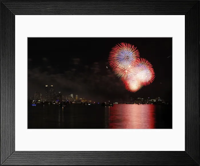 Framed Print : Fireworks explode over the Hudson River and the skyline of New York during the Macy s