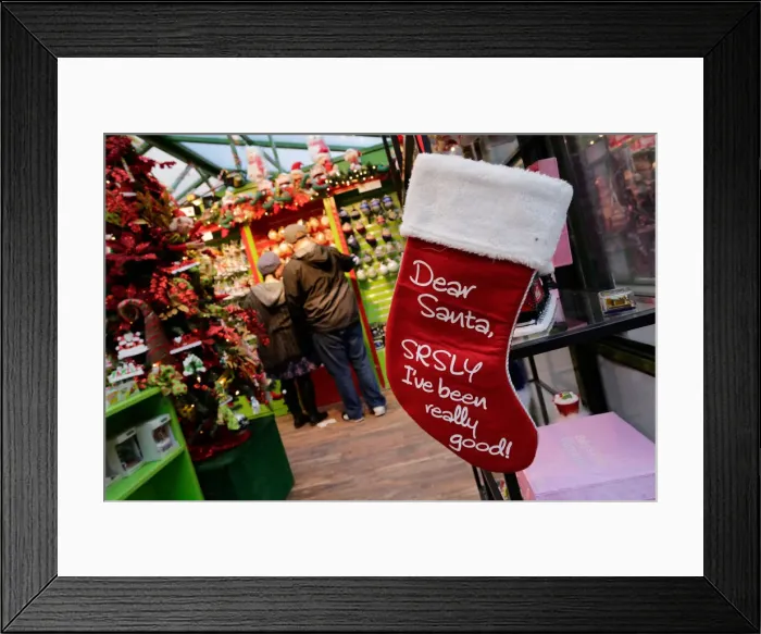 Framed Print : Shoppers buy Christmas stuff in the Manhattan borough of New York City, New York Framed Print : Shoppers buy Christmas stuff in the Manhattan borough of New York City, New York