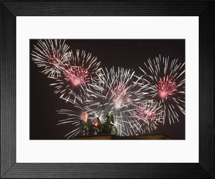 Framed Print : Fireworks explode next to the Quadriga sculpture atop the Brandenburg gate during Framed Print : Fireworks explode next to the Quadriga sculpture atop the Brandenburg gate during