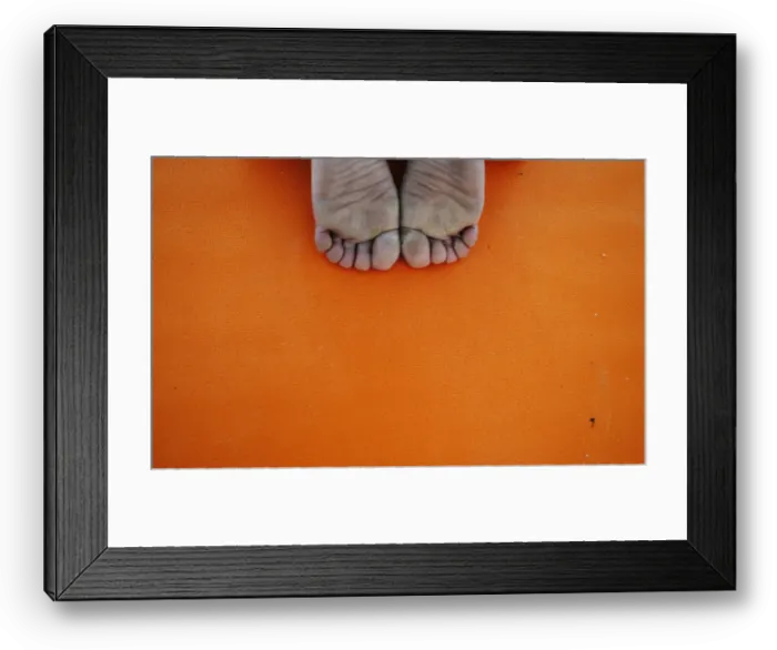 Framed Print : A person takes part in a free yoga class at the Parque del Oeste in Madrid Framed Print : A person takes part in a free yoga class at the Parque del Oeste in Madrid