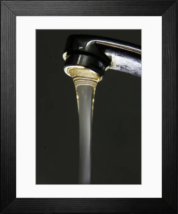 Framed Print : Water flows from a tap in Kiev Framed Print : Water flows from a tap in Kiev