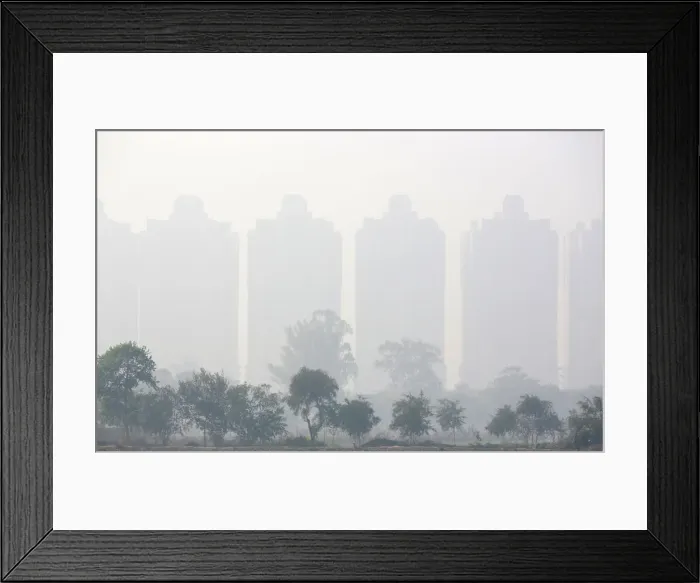 Framed Print : Apartments are shrouded by smog in Noida Framed Print : Apartments are shrouded by smog in Noida