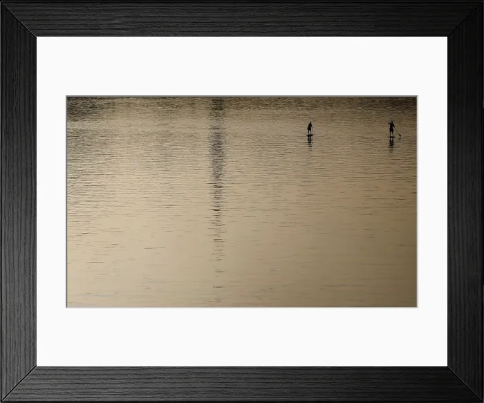 Framed Print : Two men enjoy a sunny afternoon as they paddle on the river Main in Frankfurt Framed Print : Two men enjoy a sunny afternoon as they paddle on the river Main in Frankfurt