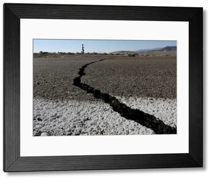 Framed Print : Fissures that opened up under a highway during a powerful earthquake that struck Southern