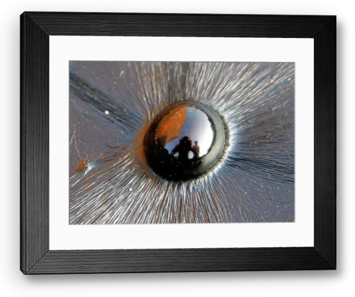Framed Print : Workers are reflected on a bubble of melted tar on a road in Jammu Framed Print : Workers are reflected on a bubble of melted tar on a road in Jammu