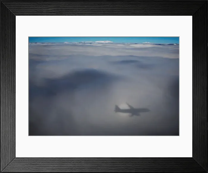 Framed Print : Shadow of Aeroflot Airbus A320 aircraft is seen on clouds Framed Print : Shadow of Aeroflot Airbus A320 aircraft is seen on clouds