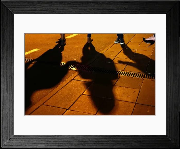 Framed Print : People cast their shadows outside a bar in Moscow, Russia Framed Print : People cast their shadows outside a bar in Moscow, Russia