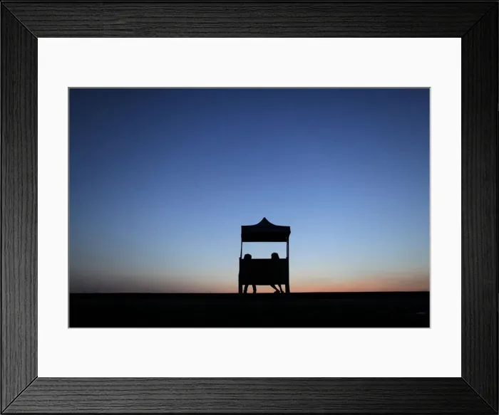 Framed Print : Two girls sit on a bench by a lake in Yangon at sunrise Framed Print : Two girls sit on a bench by a lake in Yangon at sunrise
