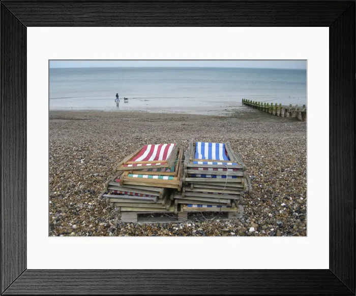 Framed Print : People walk their dog, in light rain, on the empty beach of the south coast holiday Framed Print : People walk their dog, in light rain, on the empty beach of the south coast holiday