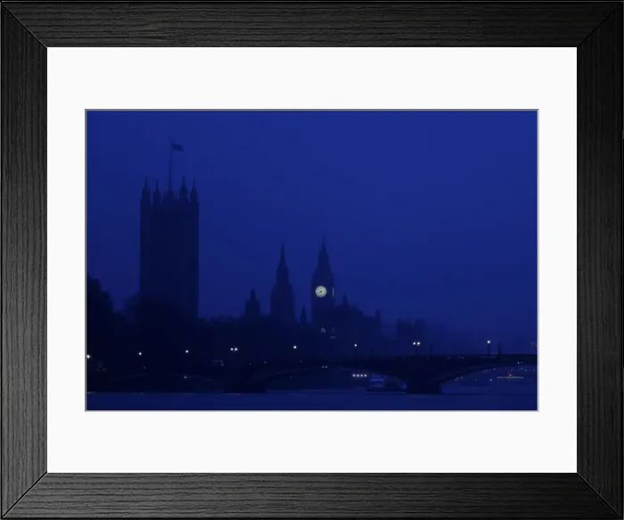 Framed Print : The Houses of Parliament are seen in early morning mist in central London Framed Print : The Houses of Parliament are seen in early morning mist in central London