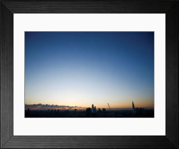 Framed Print : The sun rises during the Summer Solstice, seen from atop the London Eye, in London