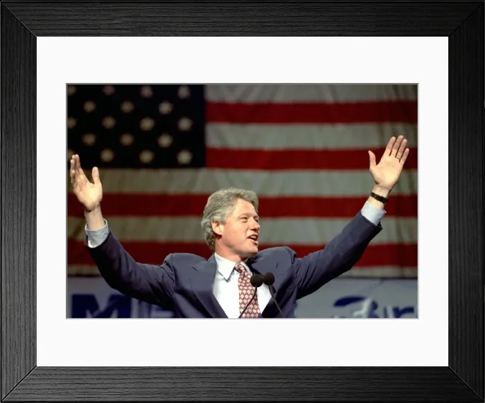 Framed Print : Democratic presidential candidate Bill Clinton raises his arms to supports during Framed Print : Democratic presidential candidate Bill Clinton raises his arms to supports during