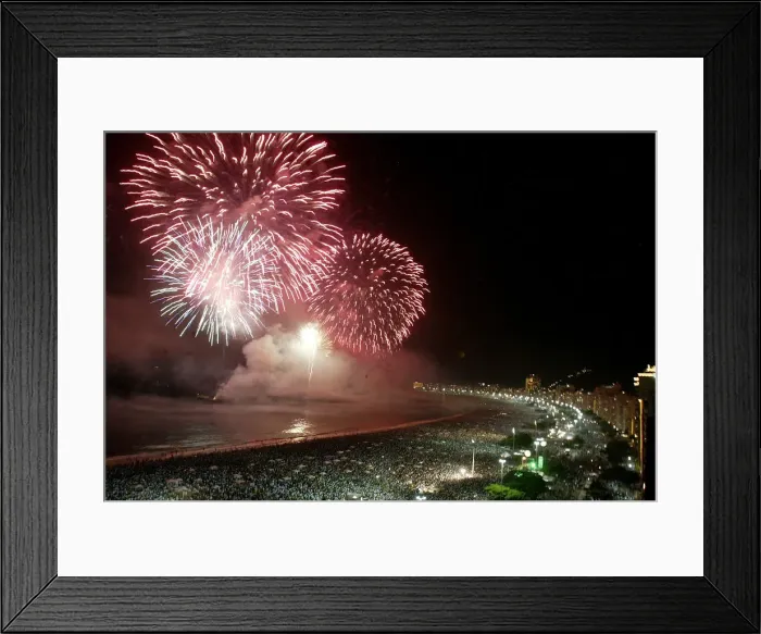 Framed Print : Fireworks explode above Copacabana beach in Rio de Janeiro at midnight Framed Print : Fireworks explode above Copacabana beach in Rio de Janeiro at midnight