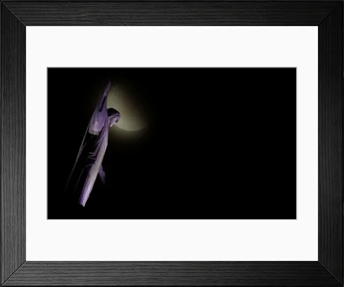 Framed Print : The moon is seen next to the statue of Christ the Redeemer during a total lunar eclipse Framed Print : The moon is seen next to the statue of Christ the Redeemer during a total lunar eclipse