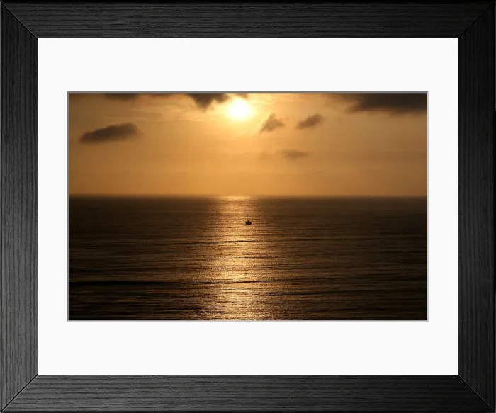 Framed Print : A sailboat sails during sunset in the Pacific Ocean in Lima Framed Print : A sailboat sails during sunset in the Pacific Ocean in Lima