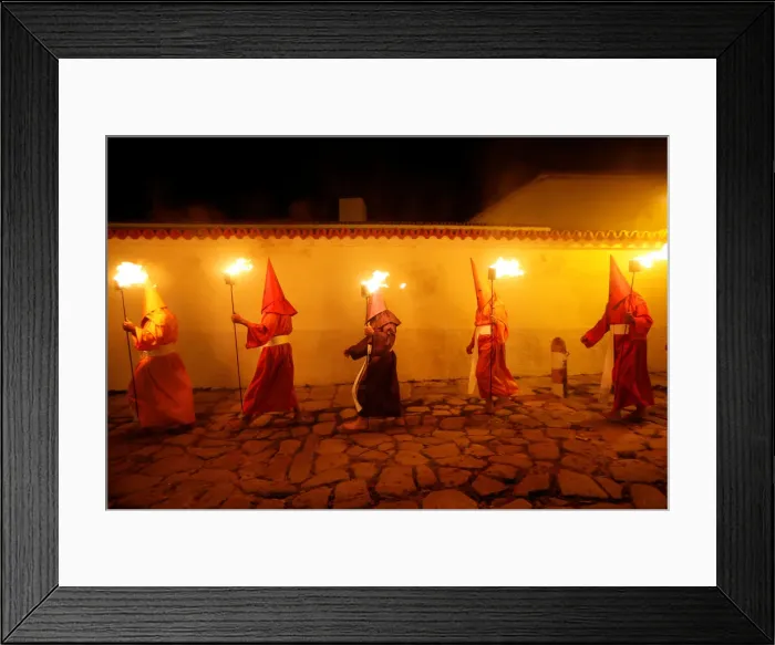 Framed Print : Penitents attend the Procession of the Torches during Holy Week in Goias Velho, west Framed Print : Penitents attend the Procession of the Torches during Holy Week in Goias Velho, west