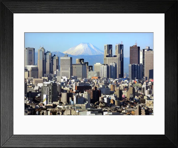 Framed Print : Japans Mt Fuji, covered with snow, is seen through Shinjuku skyscrapers in Tokyo Framed Print : Japans Mt Fuji, covered with snow, is seen through Shinjuku skyscrapers in Tokyo