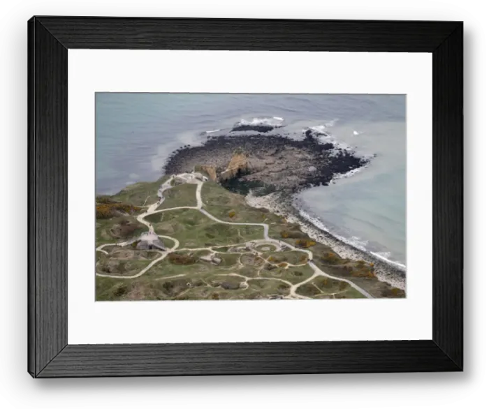 Framed Print : An aerial view shows the Pointe du Hoc cliffs and memorial in the Normandy region Framed Print : An aerial view shows the Pointe du Hoc cliffs and memorial in the Normandy region