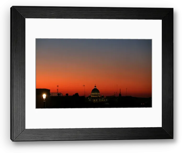 Framed Print : St. Peters basilica is seen at sunset from downtown Rome