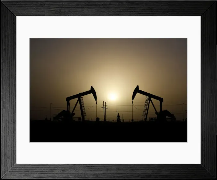 Framed Print : Pump jacks operate at sunset in Midland Framed Print : Pump jacks operate at sunset in Midland
