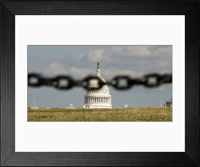 Framed Print : U. S. Capitol is photographed behind a chain fence in Washington Framed Print : U. S. Capitol is photographed behind a chain fence in Washington