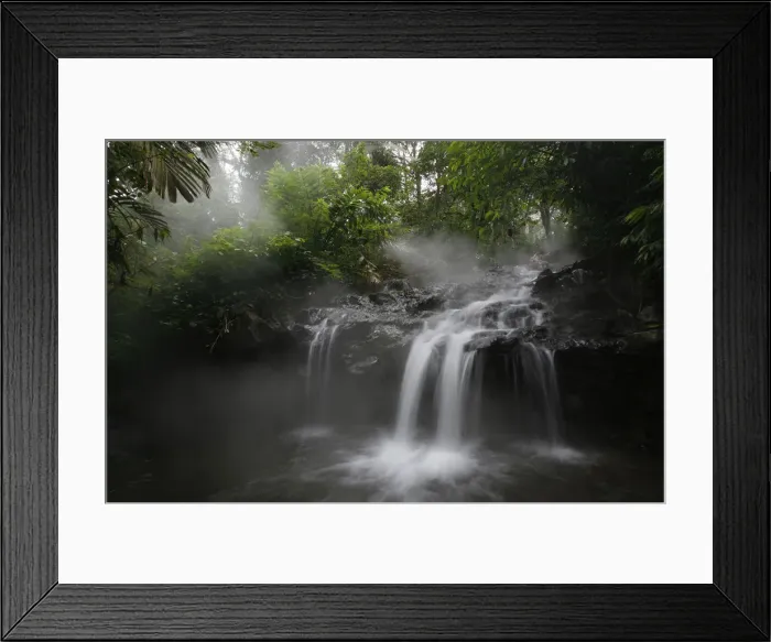 Framed Print : A view of a waterfall in the protected forest at the Welirang mountain in Malang Framed Print : A view of a waterfall in the protected forest at the Welirang mountain in Malang