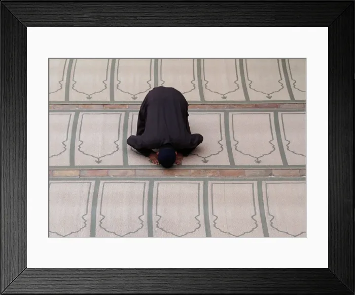 Framed Print : A man offers evening prayer at a mosque in Peshawar Framed Print : A man offers evening prayer at a mosque in Peshawar