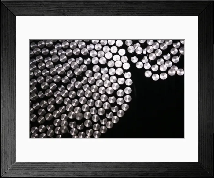 Framed Print : Cold drawn steel bars are pictured at a production line at Schmolz + Bickenbach Framed Print : Cold drawn steel bars are pictured at a production line at Schmolz + Bickenbach