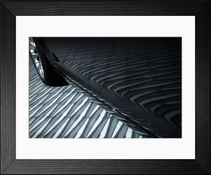 Framed Print : Car manufacturers display their wares on the show floor of the North American International