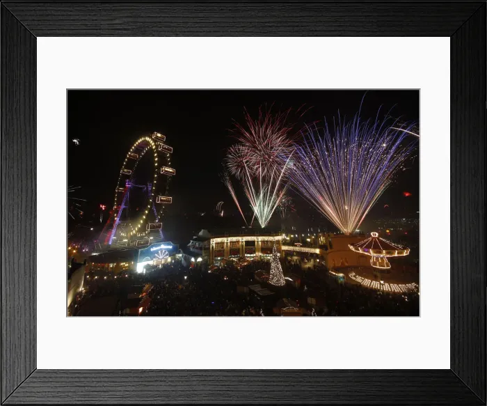 Framed Print : Fireworks explode beside Viennas Giant Ferris Wheel at Prater park during New Year