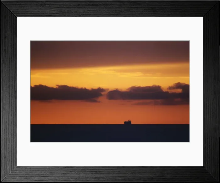 Framed Print : A ship is seen on the horizon of the Atlantic ocean, in Havana