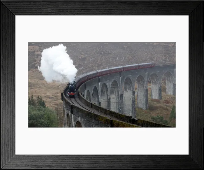 Framed Print : The Jacobite steam train crosses the Glenfinnan Viaduct in Scotland Framed Print : The Jacobite steam train crosses the Glenfinnan Viaduct in Scotland