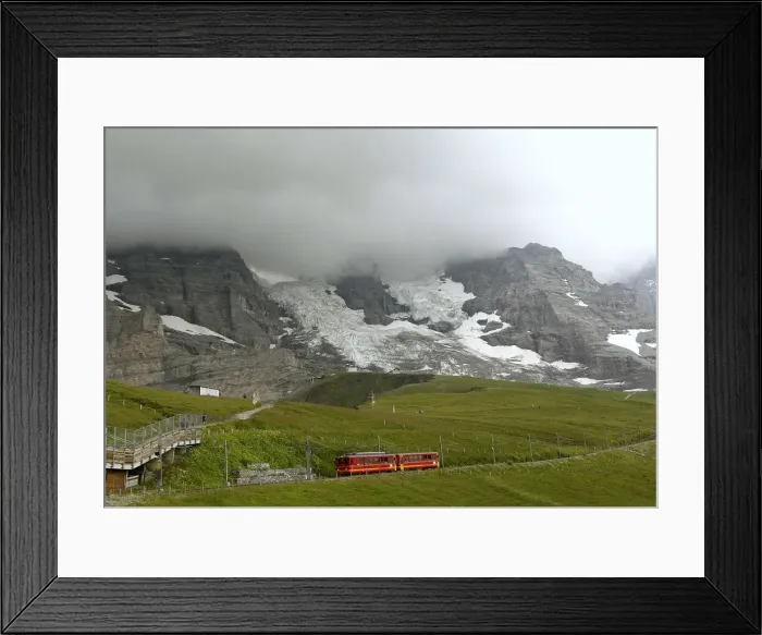 Framed Print : Tourists leave a train of the Jungfraubahn railways at the Kleine Scheidegg station Framed Print : Tourists leave a train of the Jungfraubahn railways at the Kleine Scheidegg station