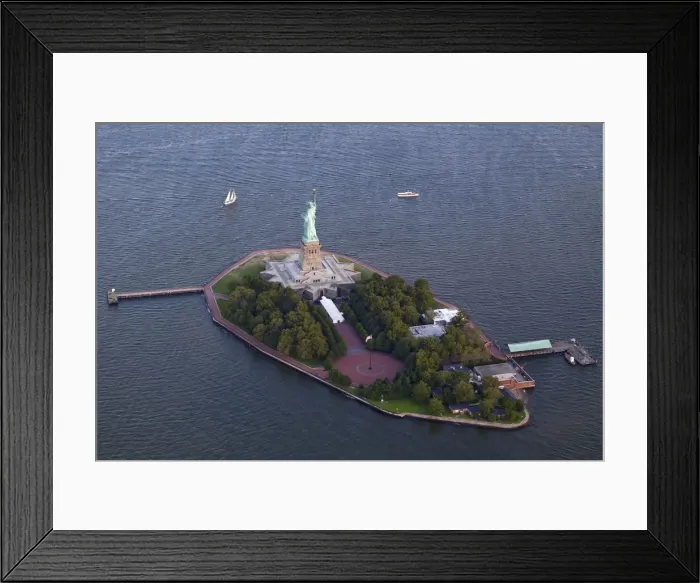 Framed Print : The Statue of Liberty stands in New York Harbor