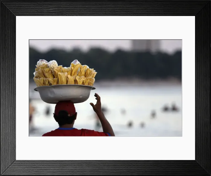 Framed Print : A vendor sells Amazon food next to the Negro River in Manaus Framed Print : A vendor sells Amazon food next to the Negro River in Manaus