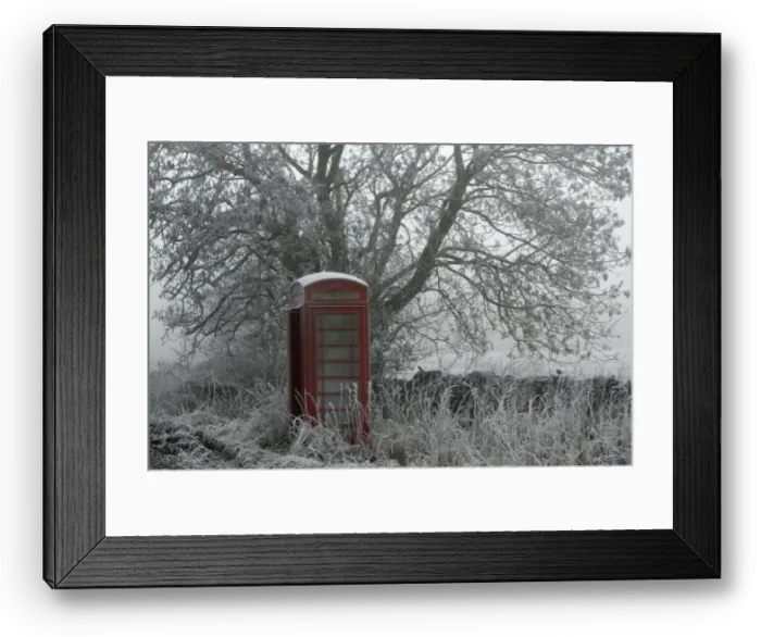 Framed Print : A frost covered telephone box stands in Newhaven, central England Framed Print : A frost covered telephone box stands in Newhaven, central England