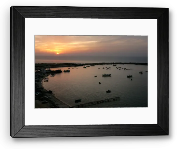 Framed Print : Palestinian fishermen are seen fishing during the last sunset of the year in Gaza Framed Print : Palestinian fishermen are seen fishing during the last sunset of the year in Gaza