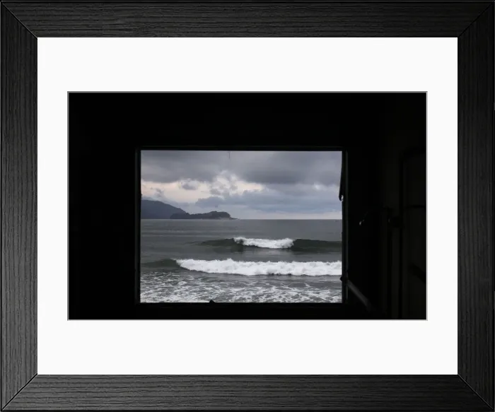 Framed Print : Waves in the sea are seen through a window of a building destroyed by March 11s magnitude 9 Framed Print : Waves in the sea are seen through a window of a building destroyed by March 11s magnitude 9