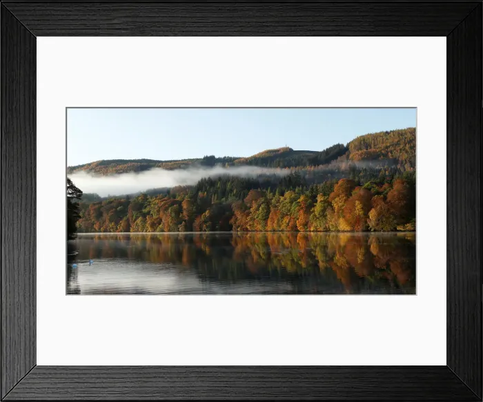 Framed Print : Autumnal foliage is reflected on Loch Faskally, Pitlochry, Scotland